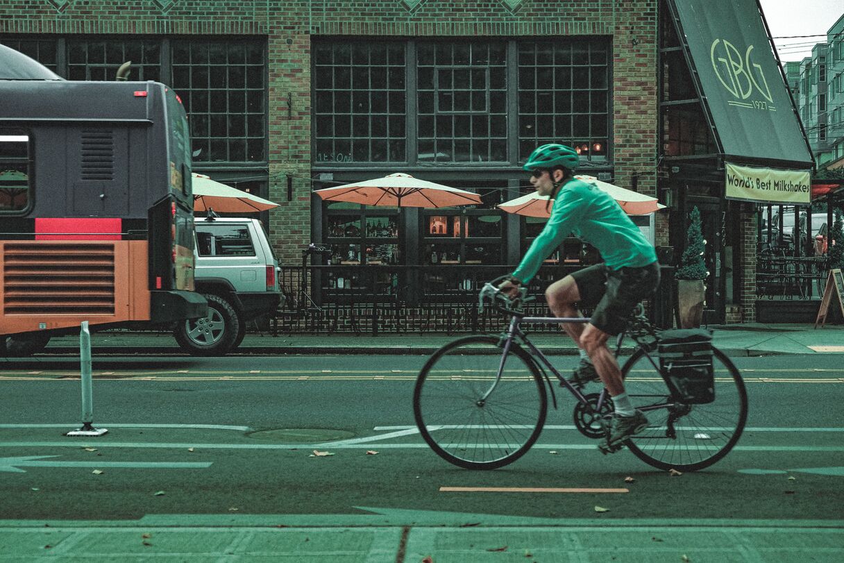Cyclist wearing safety gear at night